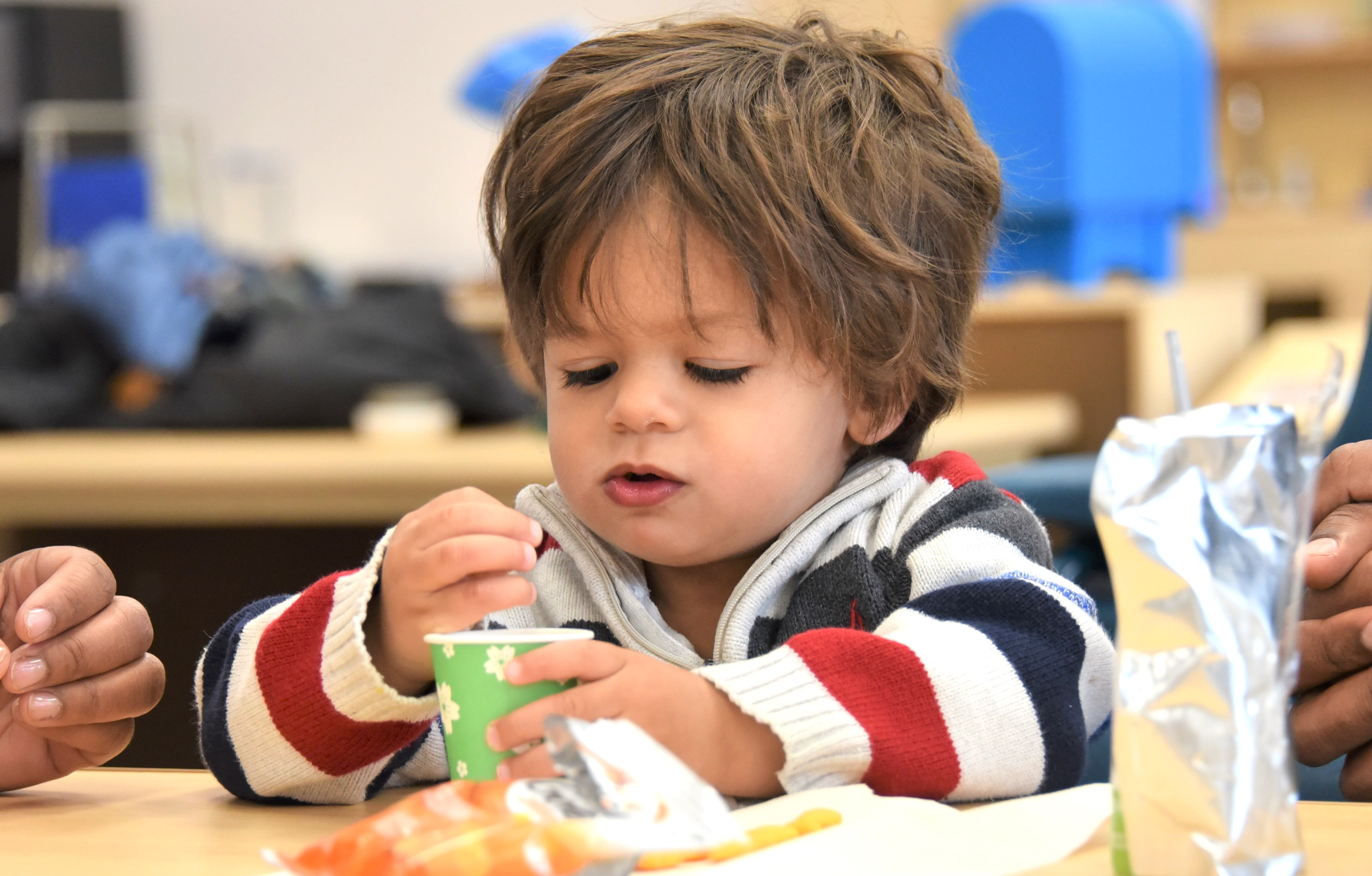 Young child eating a snack